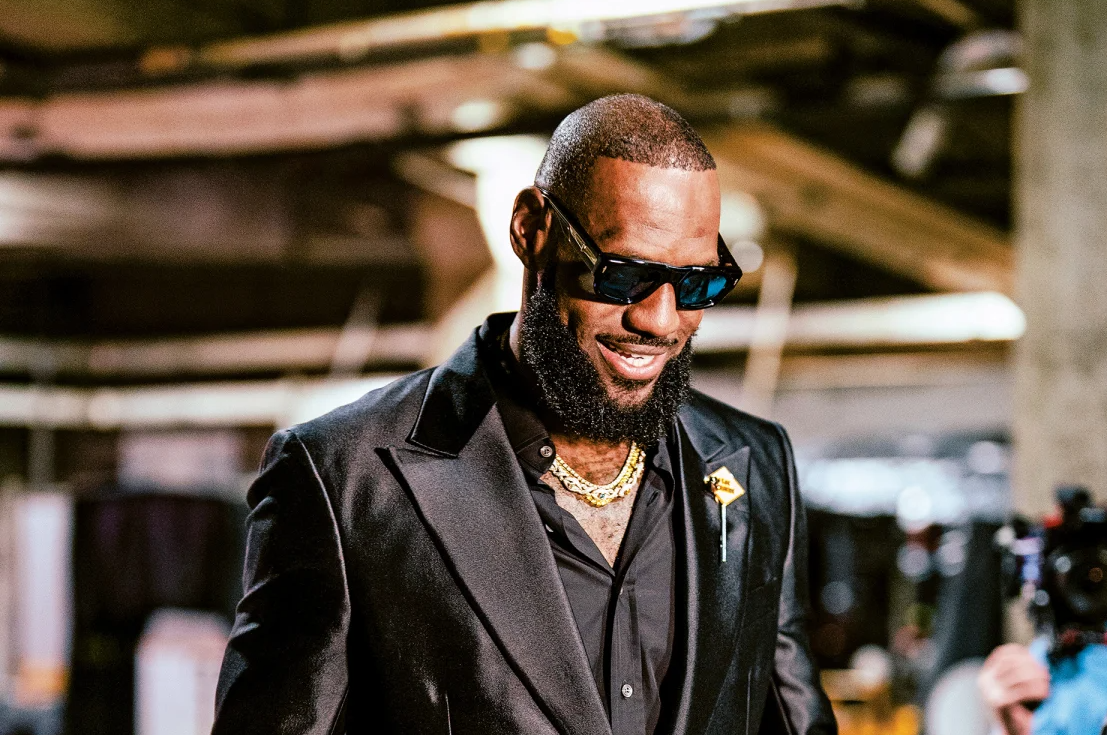 Pictured above, a sharply suited LeBron James arrives for a Los Angeles Lakers game against the Oklahoma City Thunder on February 7, 2023. Tyler Ross/NBAE/Getty Images/Courtesy Workman