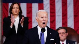 U.S. President Joe Biden delivered a fiery campaign-style speech that had Democrats like Vice-President Kamala Harris cheering, and Republicans like Speaker Mike Johnson sitting stone-faced. (Shawn Thew/Reuters)