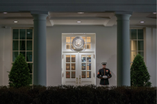 A U.S. Marine is posted outside the West Wing entrance to the White House, indicating that President Biden is present on Saturday night. (Shawn Thew/EPA-EFE/Shutterstock)