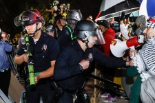 Police were met by a wall of protesters at UCLA early Thursday. PHOTO: ETIENNE LAURENT/AGENCE FRANCE-PRESSE/GETTY IMAGES