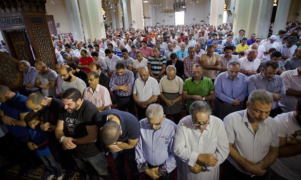 Egyptians pray for the victims of EgyptAir flight 804 at a Cairo mosque. Photograph: Amr Nabil/AP
