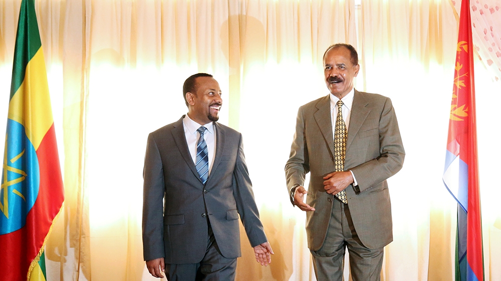 President  Isaias, right, recently visited Ethiopia to reopen  Eritrea's embassy  in Addis Ababa  [Tiksa Negeri/Reuters]