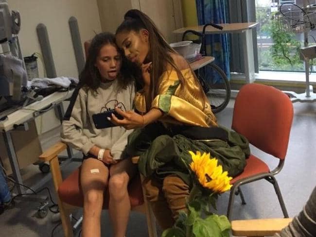 Ariana Grande visits with victims of the Manchester Arena bombing which left 22 people dead. Picture: TwitterSource:Twitter