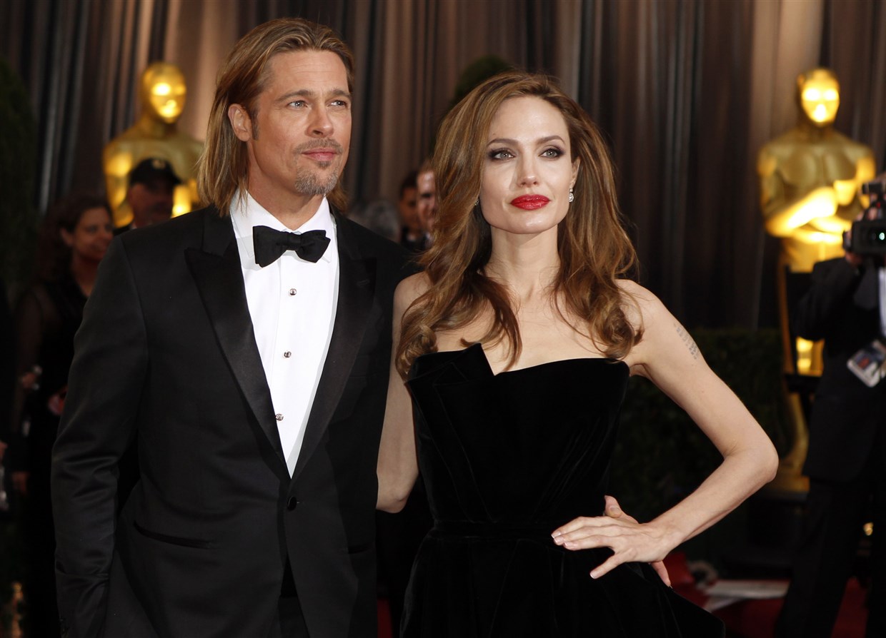 Brad Pitt poses with Angelina Jolie on the red carpet at the 84th Academy Awards in Hollywood, California, on Feb. 26, 2012.Lucas Jackson / Reuters file