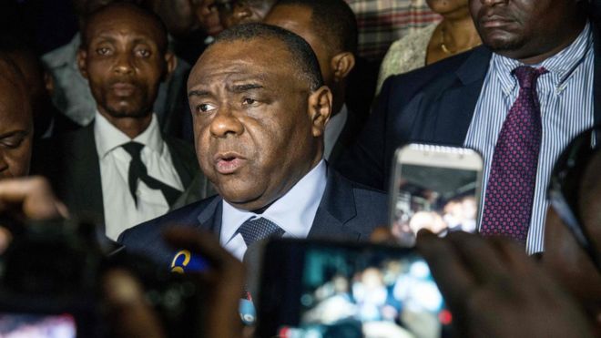 BBC / Congolese opponent Jean-Pierre Bemba (C), speaks to the press after applying