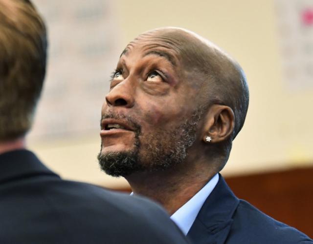 FILE - In this July, 9, 2018, file photo, plaintiff DeWayne Johnson looks up during a brief break as the Monsanto trial in San Francisco. Monsanto is being accused of hiding the dangers of its popular Roundup products. A San Francisco jury on Friday, Aug.