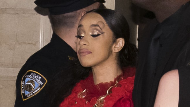 Cardi B, with a bump on her forehead, leaves after an altercation at the Harper's BAZAAR ICONS by Carine Roitfeld party with Nicki Minaj. Picture: Charles SykesSource:AP