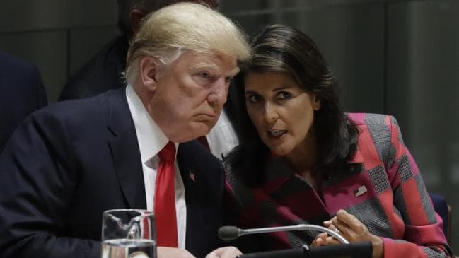 President Donald Trump talks to Nikki Haley, the US ambassador to the United Nations. Picture: APSource:AP