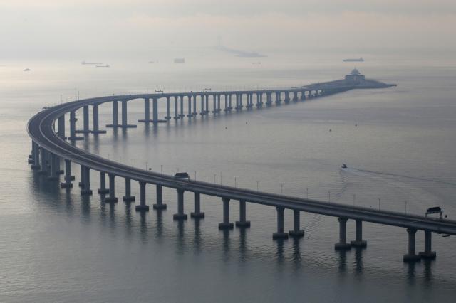 The Hong Kong-Zhuhai-Macau Bridge is seen in Hong Kong, Monday, Oct. 22, 2018. The bridge, the world&#39;s longest cross-sea project, which has a total length of 55 kilometers (34 miles), will have opening ceremony in Zhuhai on Oct. 23. &