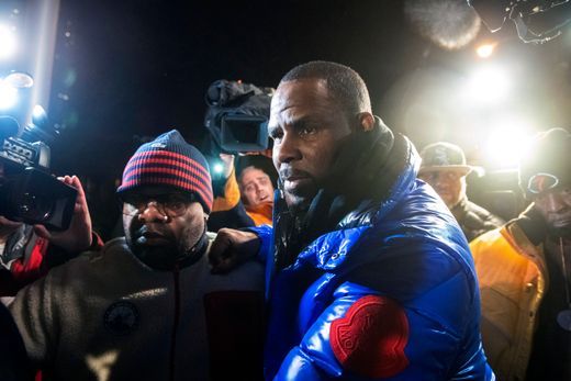 R. Kelly surrenders to authorities at Chicago First District police station, Friday, Feb. 22, 2019. R&B star R. Kelly was taken into custody after arriving Friday night at a Chicago police precinct, hours after authorities announced multiple charges o