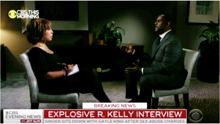 Embattled R&B star R. Kelly angrily blamed his ex-wife for 'destroying' his name and claimed other people stole from his bank accounts during new portions of a CBS News interview that aired Thursday, a day after he was sent to jail for not p