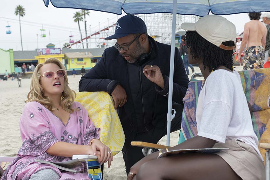 Us director Jordan Peele on set with Elisabeth Moss and Lupita Nyong'o. Says Peele, of following up his Oscar-winning Get Out: "It came down to this idea of make your favorite movie that you've never seen before."