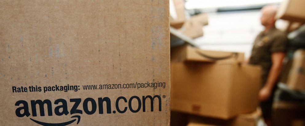 The Associated Press FILE - In this Oct. 18, 2010, file photo, an Amazon.com package awaits delivery from UPS in Palo Alto, Calif. Amazon, which hooked shoppers on getting just about anything delivered in two days, announced Thursday, April 25, 2019, that