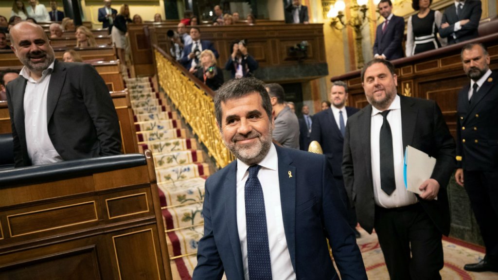 Bernat Armangue, Pool, Reuters | Jailed Catalan separatists Jordi Sanchez and Oriol Junqueras attend the opening session of parliament in Madrid, Spain, on May 21, 2019