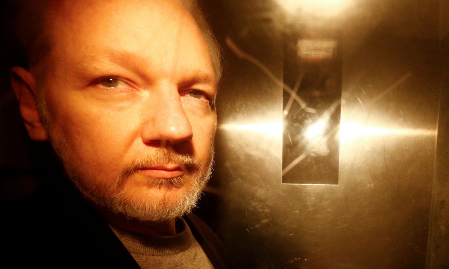 Julian Assange at court in London on 1 May to be sentenced for breach of bail. Photograph: Henry Nicholls/Reuters