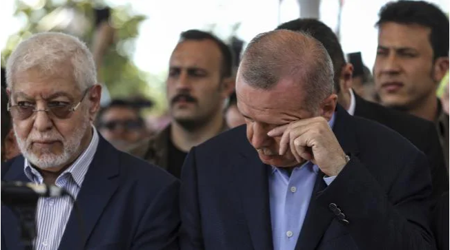 Turkish President Recep Tayyip Erdogan reacts as he attends funeral prayers in absentia for ousted former Egyptian President Mohammed Morsi, at Fatih Mosque in Istanbul. Picture: APSource:AP
