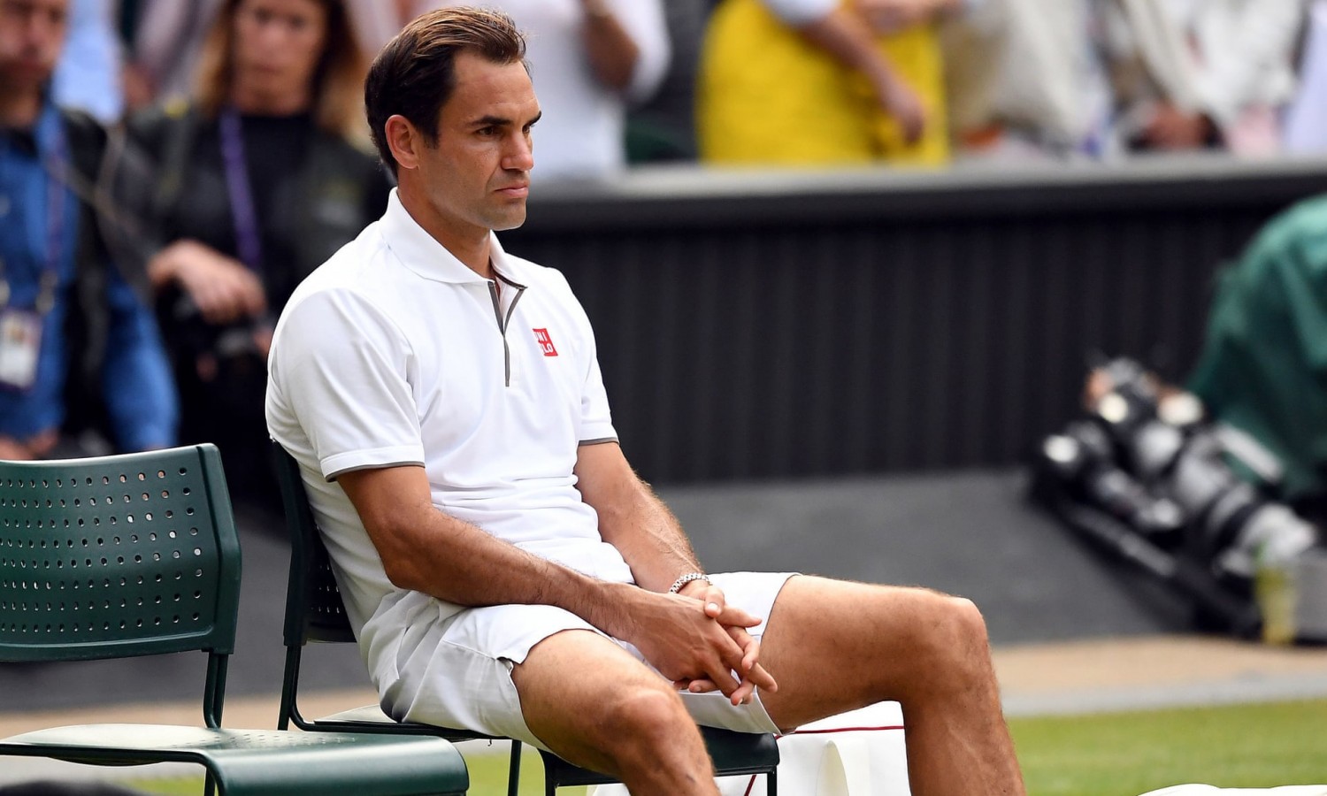 Facebook Twitter Pinterest  Roger Federer is distraught after losing in five sets. Photograph: Victoria Jones/PA