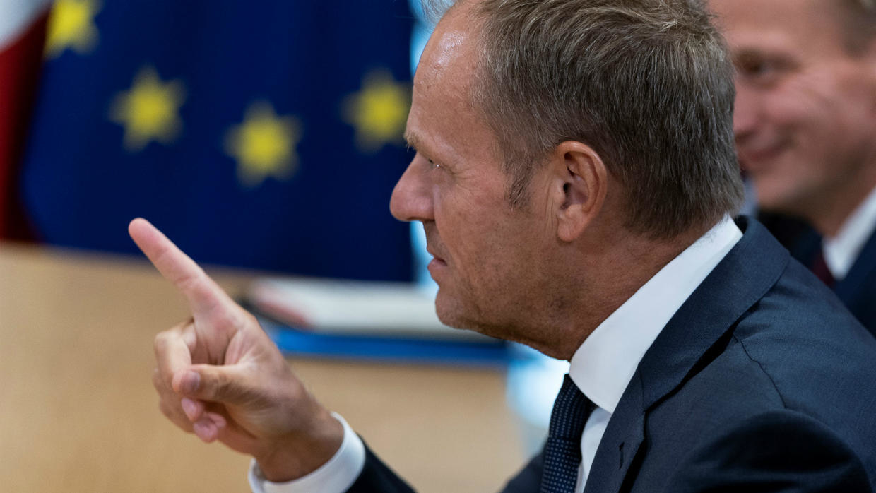 Kenzo Tribouillard, AFP | European Council President Donald Tusk speaks with Italian Prime Minister prior to a meeting at the EU Headquarters building in Brussels, on September 11, 2019.