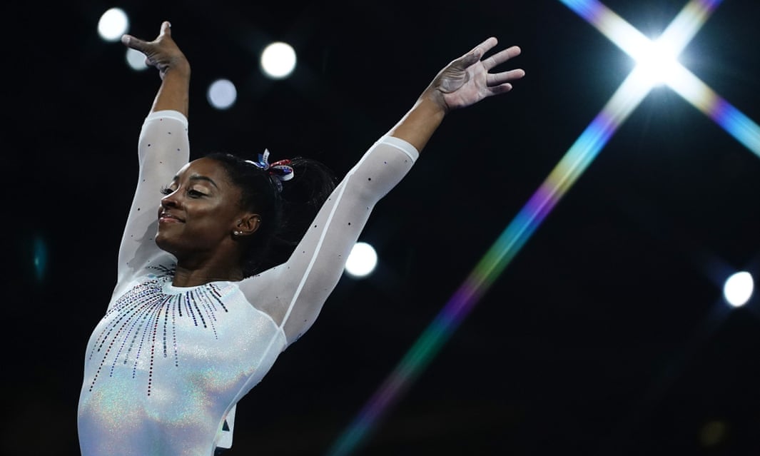 Simone Biles reacts after performing on the vault. Photograph: Lionel Bonaventure/AFP via Getty Images