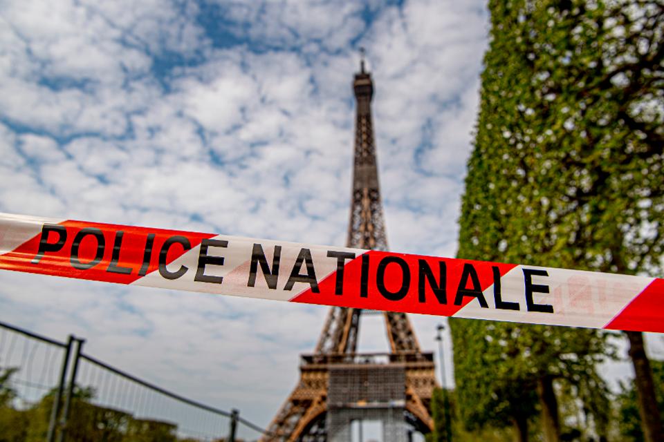Police tape blocks the path leading to the Eiffel Tower during the coronavirus pandemic. BARCROFT MEDIA VIA GETTY IMAGES