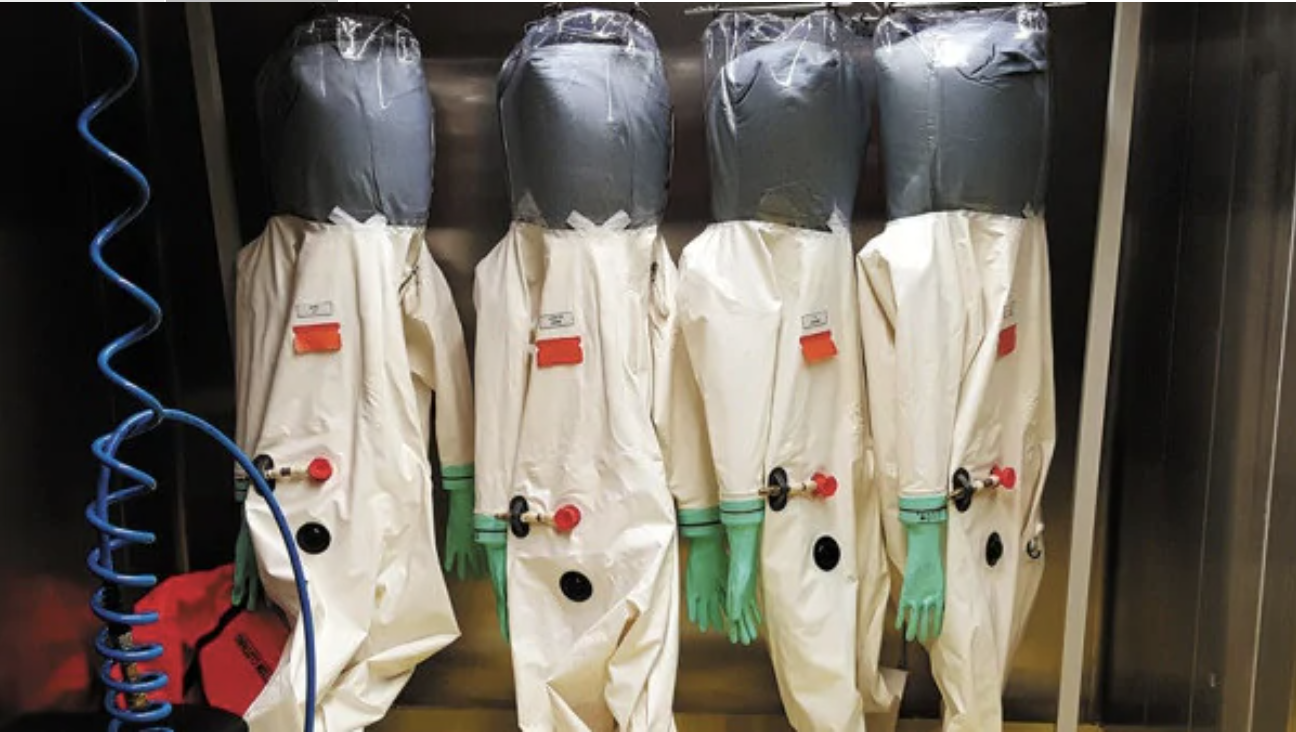 Hazmat suits intended to protect scientists from easily transmitted viruses hanging in the Wuhan Institute of Virology Credit: Wuhan Virology InstituteSource:Supplied
