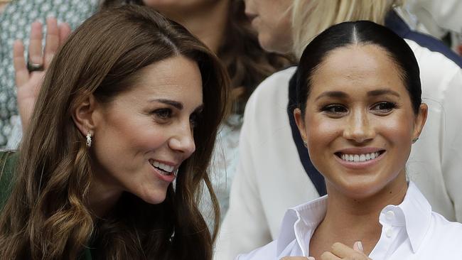 Kate and Meghan were all smiles for the cameras at Wimbledon last year. Picture: Ben Curtis/APSource:AP