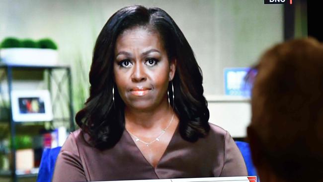Former First Lady Michelle Obama delivered a harsh review of President Trump’s performance, saying he was not up to the job. Picture: Chris Delmas / AFPSource:AFP