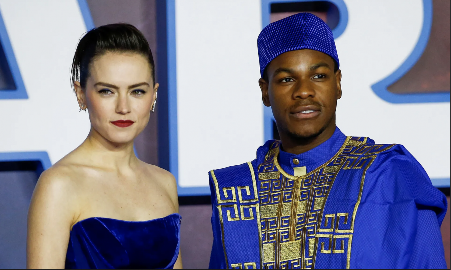 Daisy Ridley and John Boyega pose as they attend the premiere of Star Wars: The Rise of Skywalker in London. Photograph: Henry Nicholls/Reuters