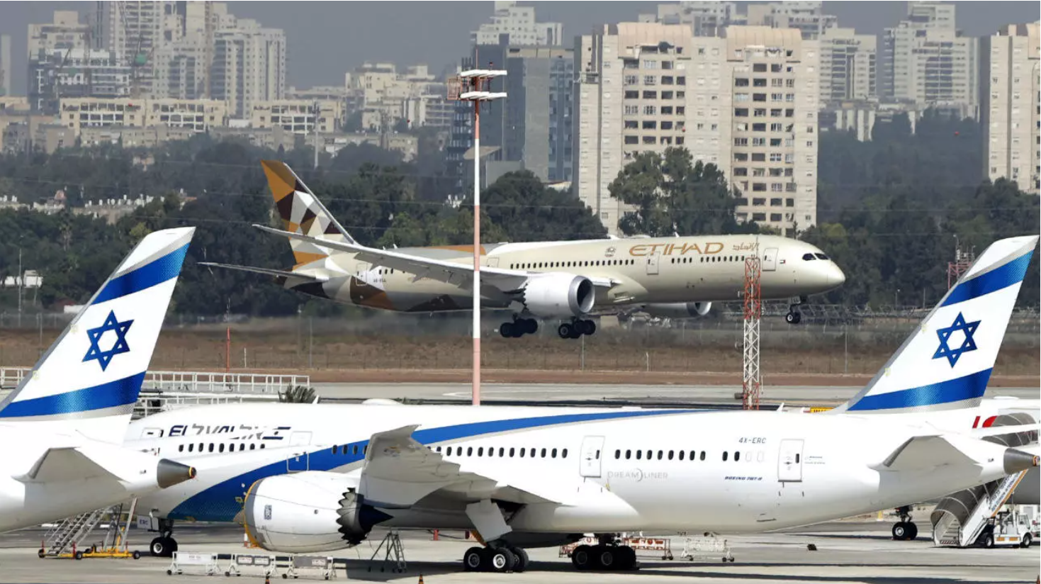 An Etihad Airways plane carrying a delegation from the United Arab Emirates (UAE) on a first official visit, lands at at Israel's Ben Gurion Airport near Tel Aviv, on October 20, 2020. An Etihad Airways plane carrying a delegation from the Un