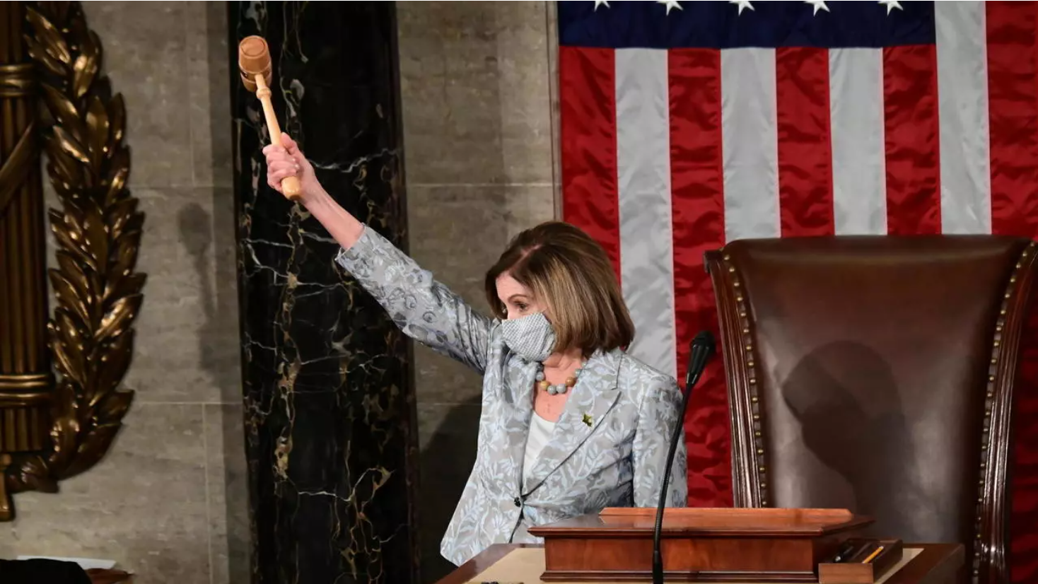 U.S. Speaker of the House Nancy Pelosi wields the Speaker's gavel after being re-elected as Speaker of the 117th House of Representatives in Washington, U.S., January 3, 2021. © REUTERS/Erin Scott/Pool