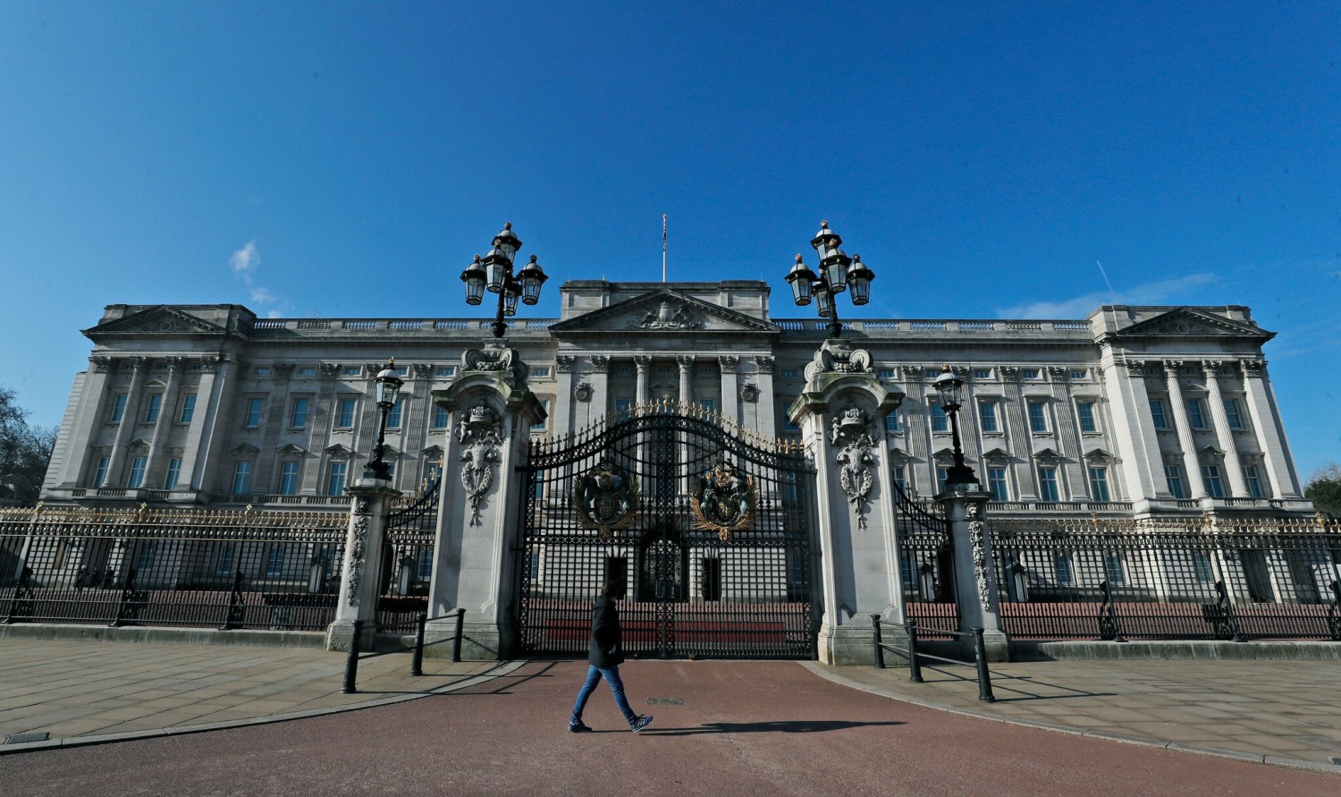 Outside Buckingham Palace in London on Tuesday.Credit...Frank Augstein/Associated Press
