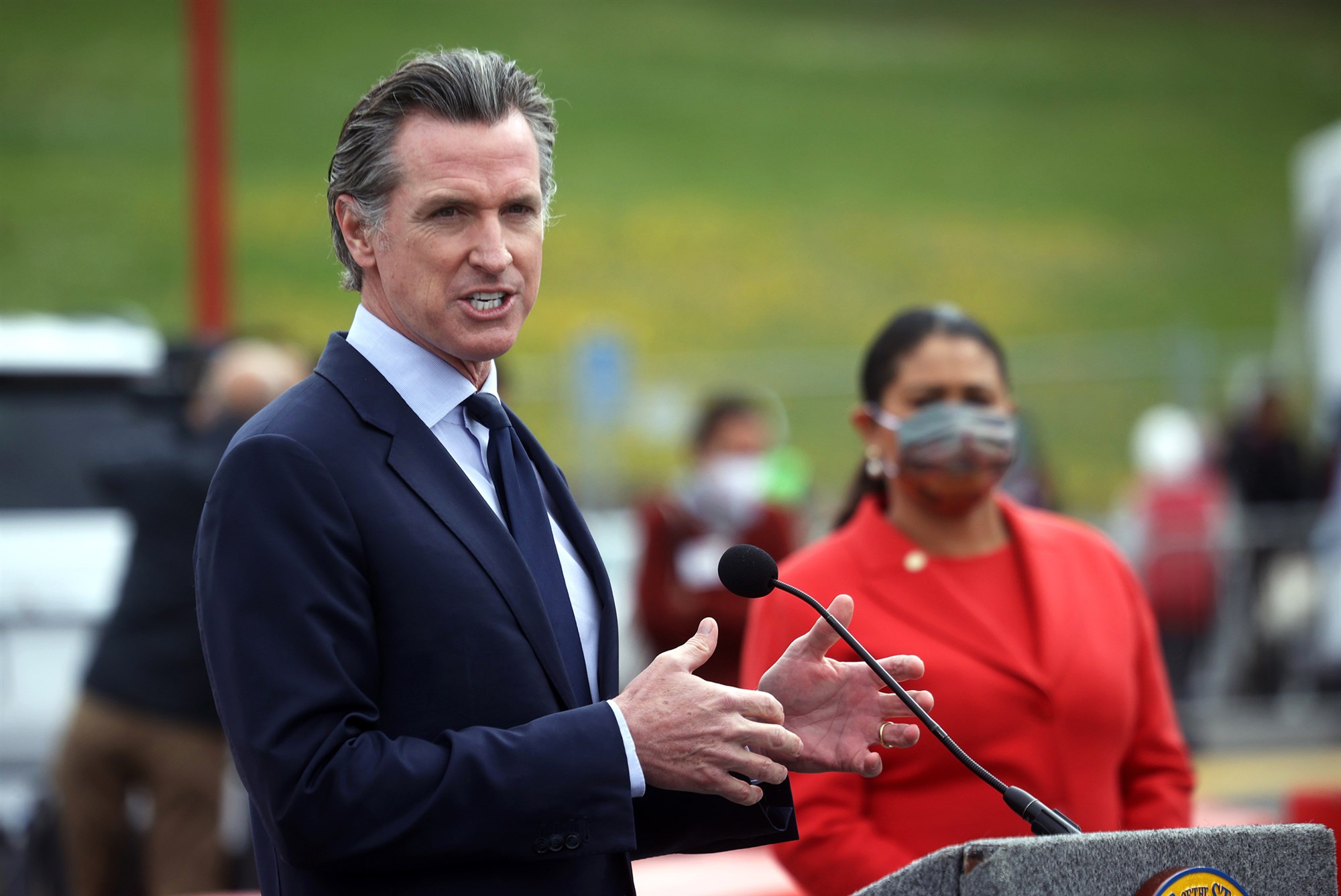 California Gov. Gavin Newsom speaks during a news conference after touring the vaccination clinic at City College of San Francisco with San Francisco Mayor London Breed, right, on April 6.Justin Sullivan / Getty Images