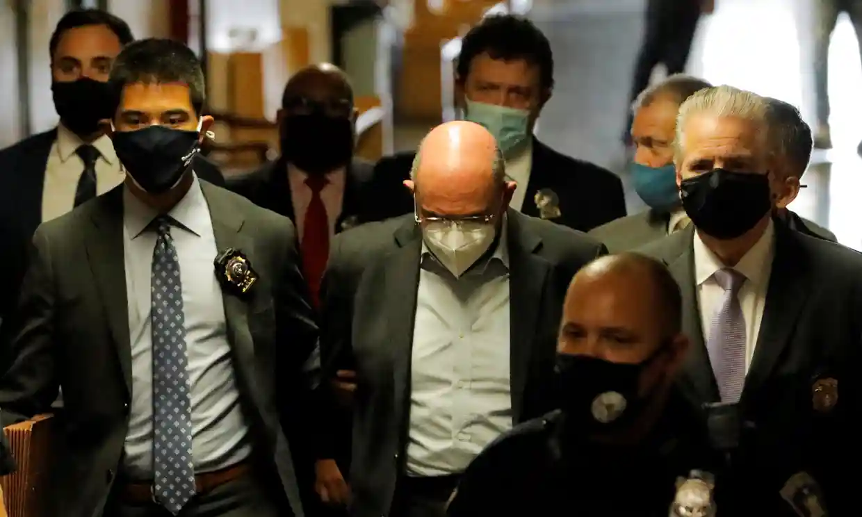 Allen Weisselberg is escorted to his arraignment hearing in New York City on Thursday. Photograph: Andrew Kelly/Reuters