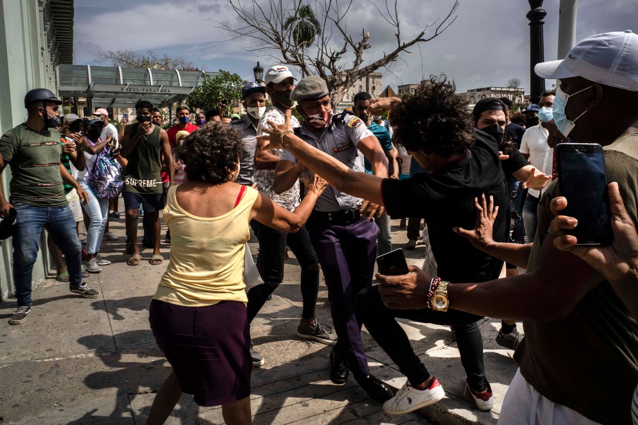 Police detained an antigovernment demonstrator during a protest in Havana on Sunday. PHOTO: ASSOCIATED PRESS