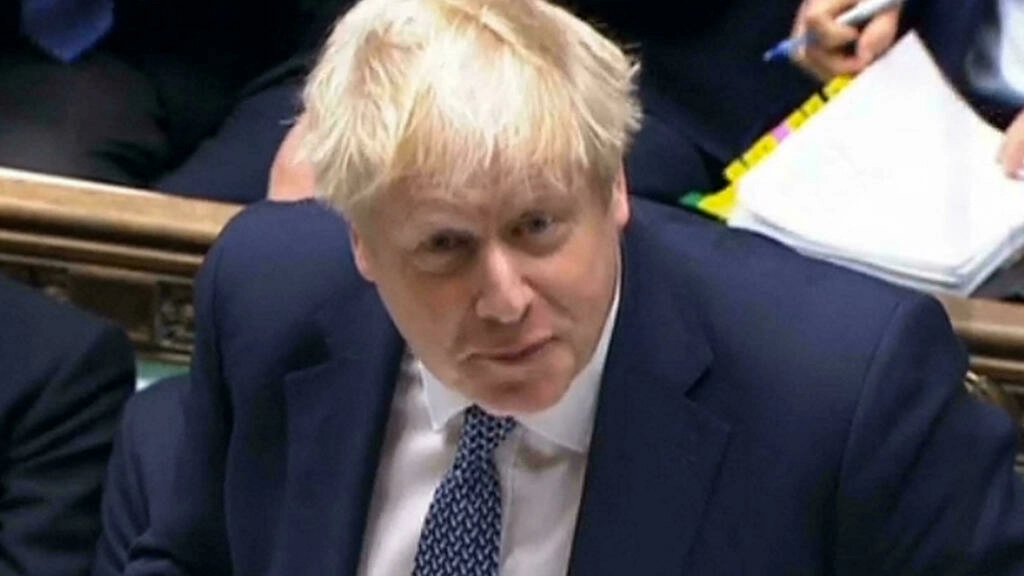 British Prime Minister Boris Johnson speaking during Prime Minister's Questions (PMQs), in the House of Commons in London on January 12, 2022. © AFP and PRU