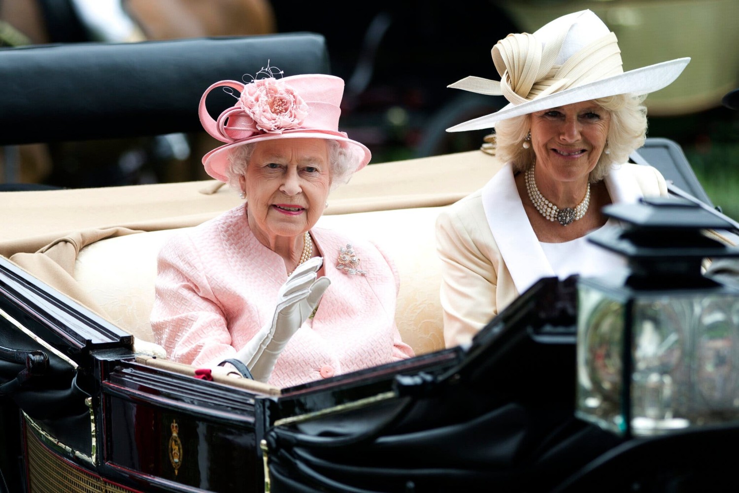 Queen Elizabeth II with Camilla, the Duchess of Cornwall, in 2013.Credit...Alastair Grant/Associated Press