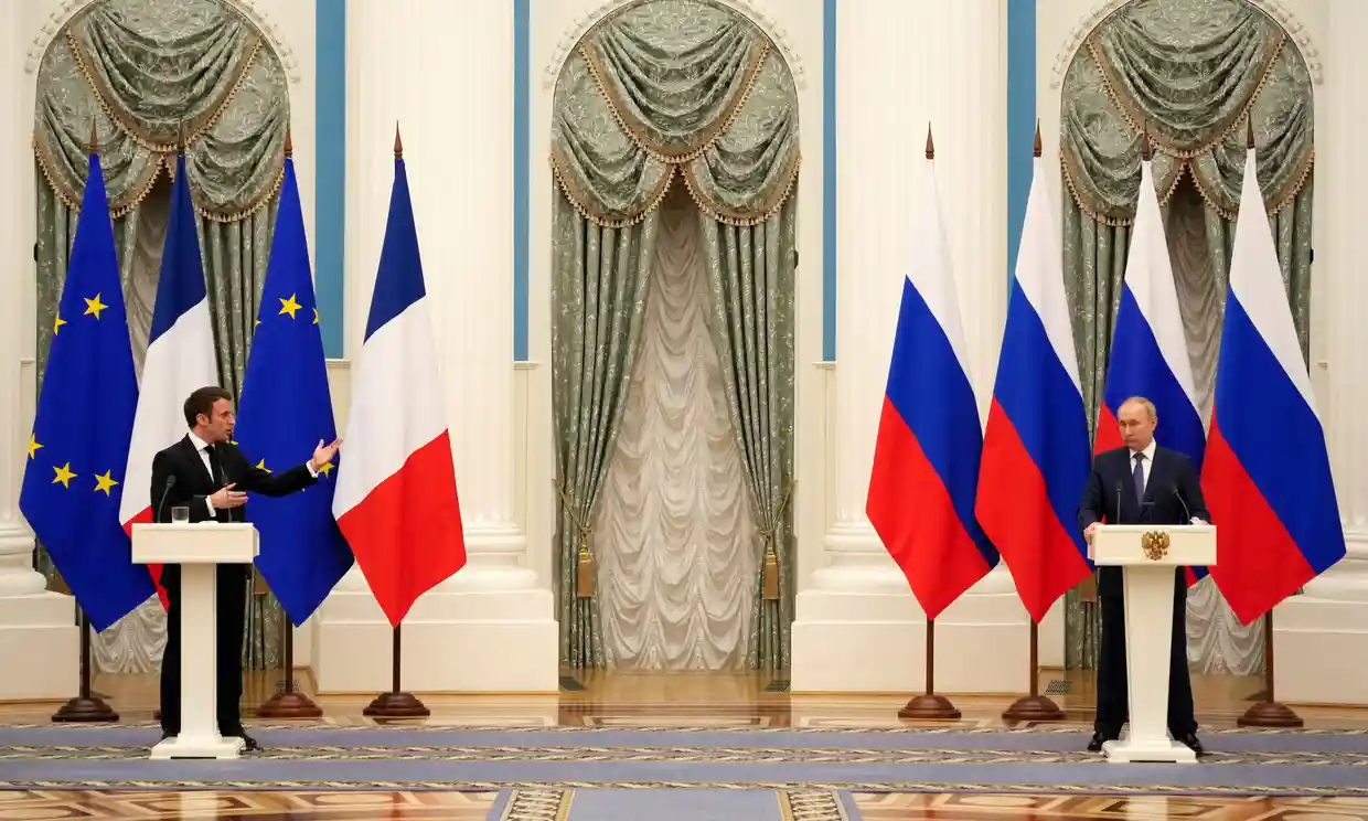 Vladimir Putin and Emmanuel Macron. The Kremlin said the Russian president had expressed serious concern over the sharp deterioration of the situation on the line of contact in Donbas. Photograph: Reuters