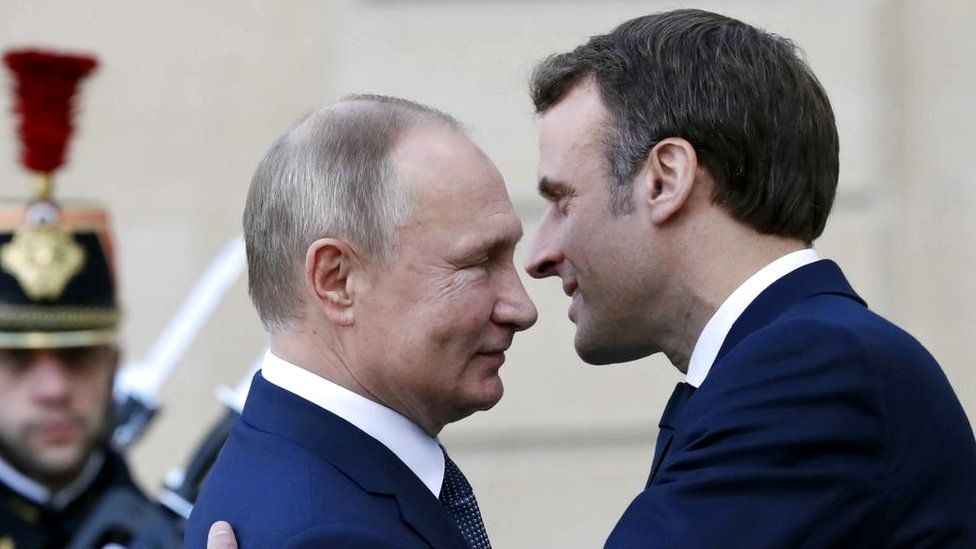 TASS/GETTY IMAGES Mr Macron (right), seen here with Mr Putin in 2019, has previously called for a renewed relationship with Russia