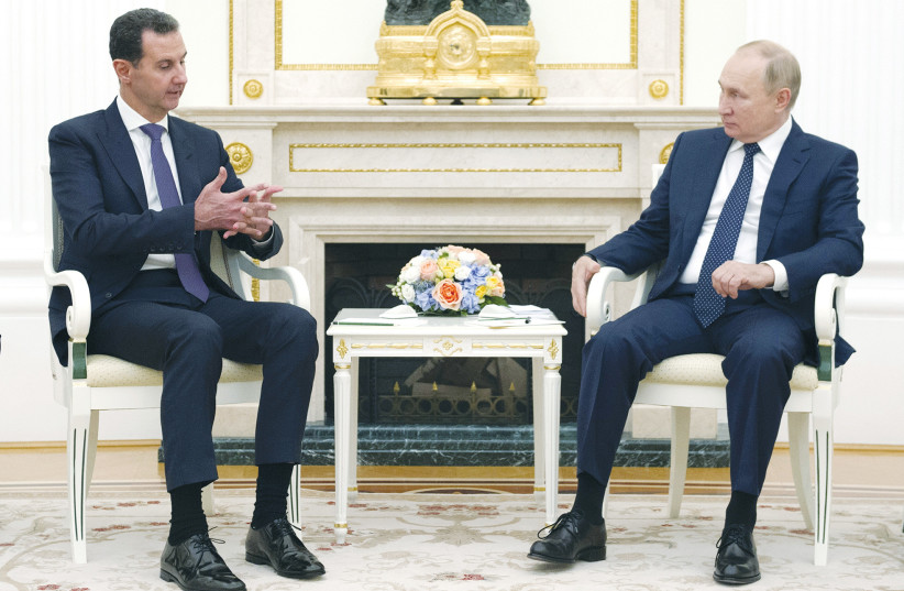 RUSSIAN PRESIDENT Vladimir Putin meets with Syrian President Bashar Assad in Moscow in September. (photo credit: Sputnik/Kremlin/Reuters)