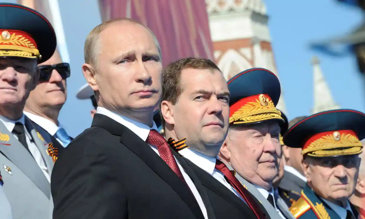 Dmitry Medvedev, pictured alongside Vladimir Putin, has warned that the west must drop sanctions on Russia to fix the food crisis sparked by its invasion of Ukraine. Photograph: Sputnik Photo Agency/Reuters