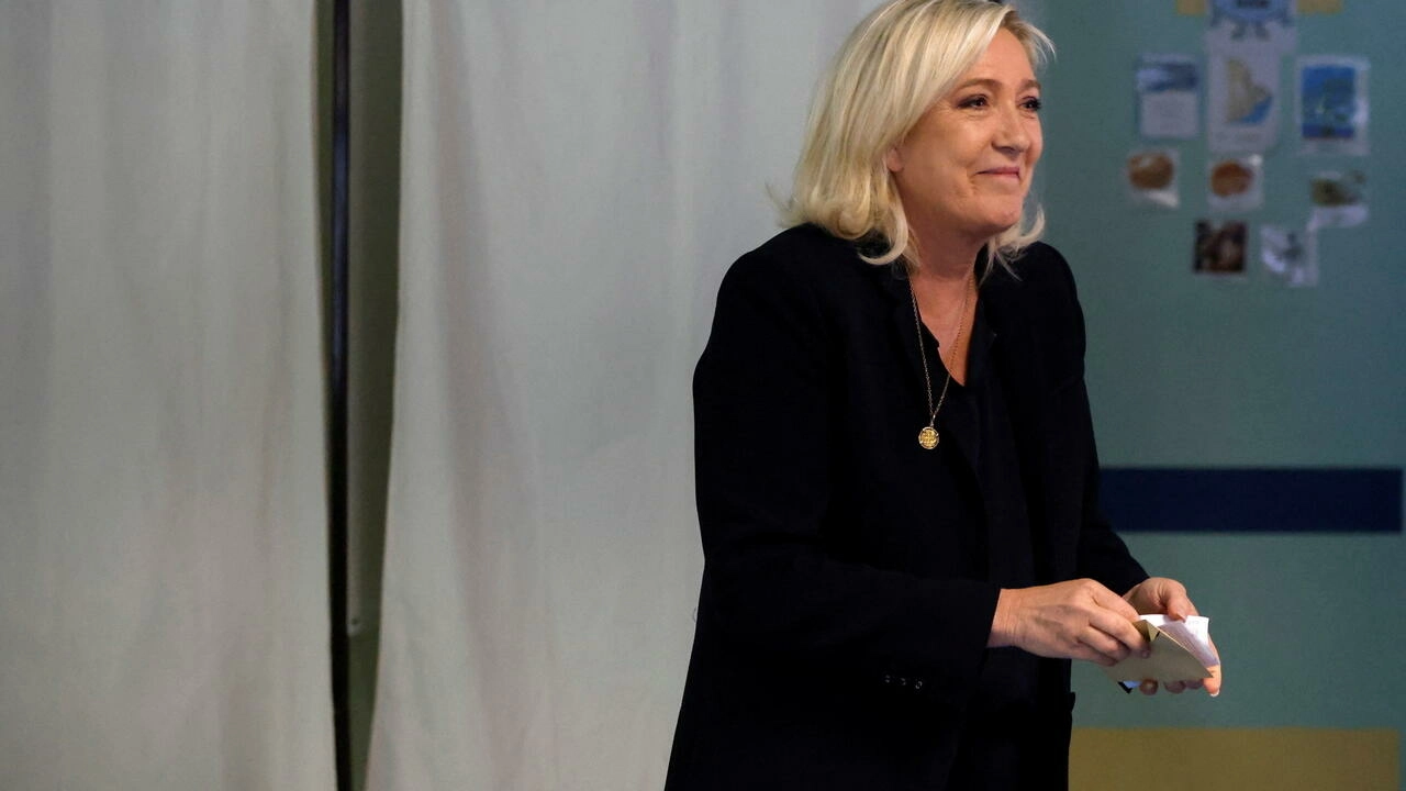 Marine Le Pen, French far-right Rassemblement National leader, votes in the second round of the French parliamentary elections, at a polling station in Henin-Beaumont, France, June 19, 2022. © Johanna Geron, Reuters