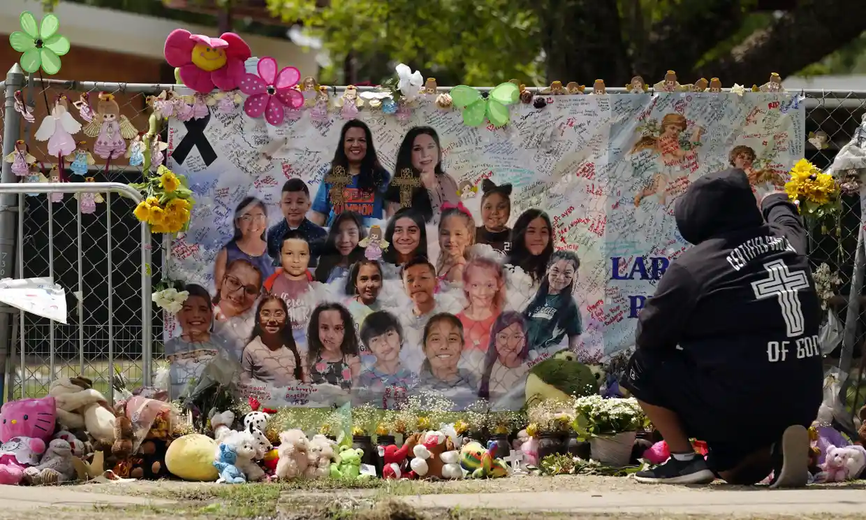A memorial at Robb elementary school created to honor the victims killed in the shooting. Photograph: Eric Gay/AP