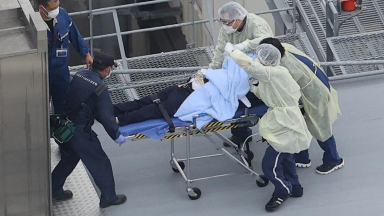 An aerial photo shows a man believed to be Abe on the stretcher at Nara Medical University Hospital in Kashihara, Nara Prefecture. Picture: Shohei Izumi / Yomiuri / The Yomiuri Shimbun via AFP