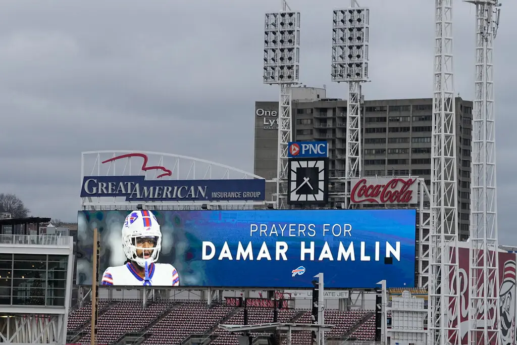A sign at Great American Ballpark in Cincinnati, near the football stadium where Damar Hamlin collapsed on Monday.Credit...Darron Cummings/Associated Press