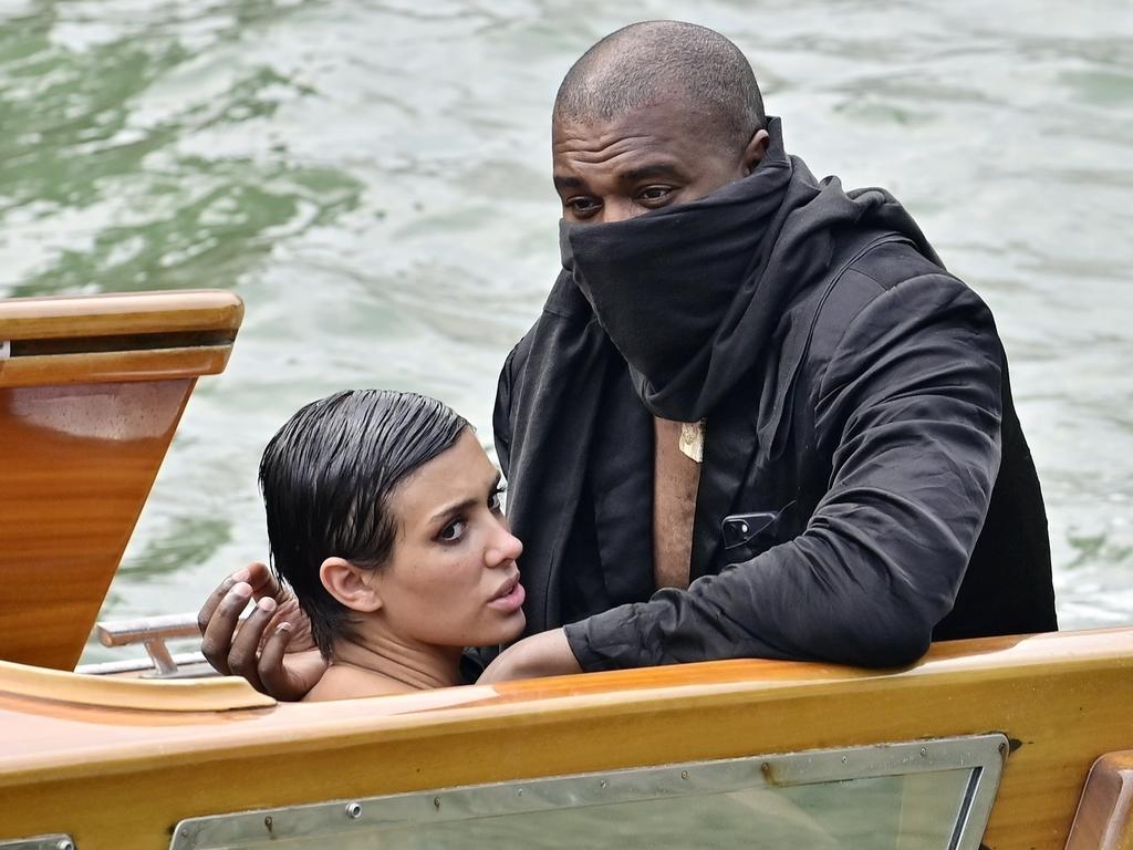 Bizarre photos have emerged of Kanye West taking a river taxi with his Australian wife Bianca Censori. Picture: COBRA TEAM/BACKGRID