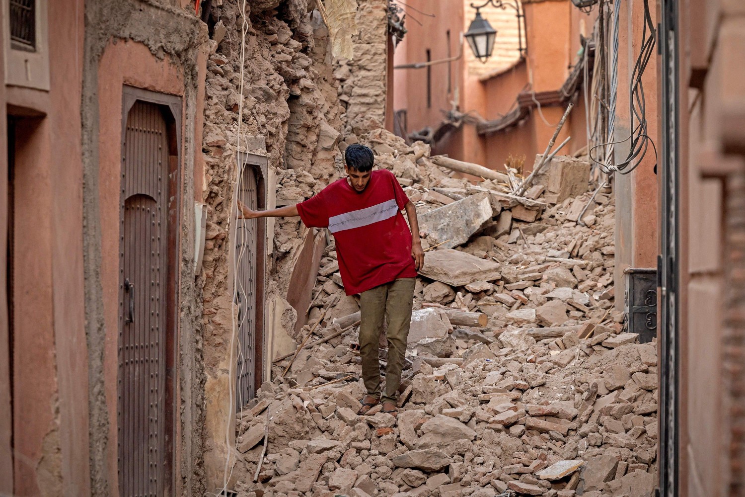 A resident navigates through the rubble in Marrakech, Morocco, on Saturday, September 9. Fadel Senna/AFP/Getty Images