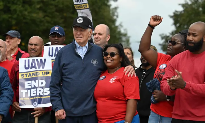 'You deserve the raise': Joe Biden becomes first sitting US president to join picket line – video