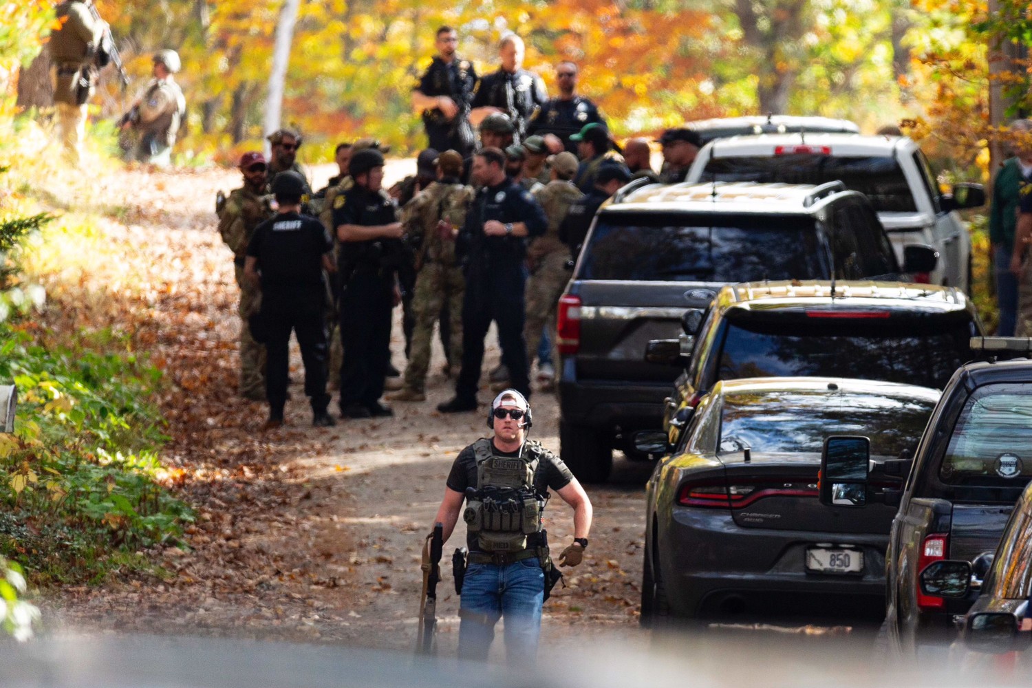 Police near a house thought to belong to suspect Robert Card’s sister in Durham, Maine, on Friday. ASHLEY L. CONTI FOR THE WALL STREET JOURNAL