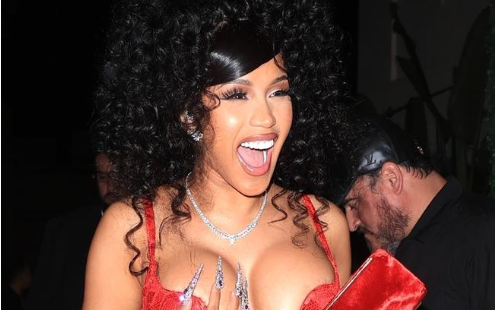 Cardi B shows off her curvy figure in a red dress as she celebrates her 31st birthday with husband Offset at celebrity hotspot Delilah in West Hollywood. Picture: ShotbyNYP / BACKGRID