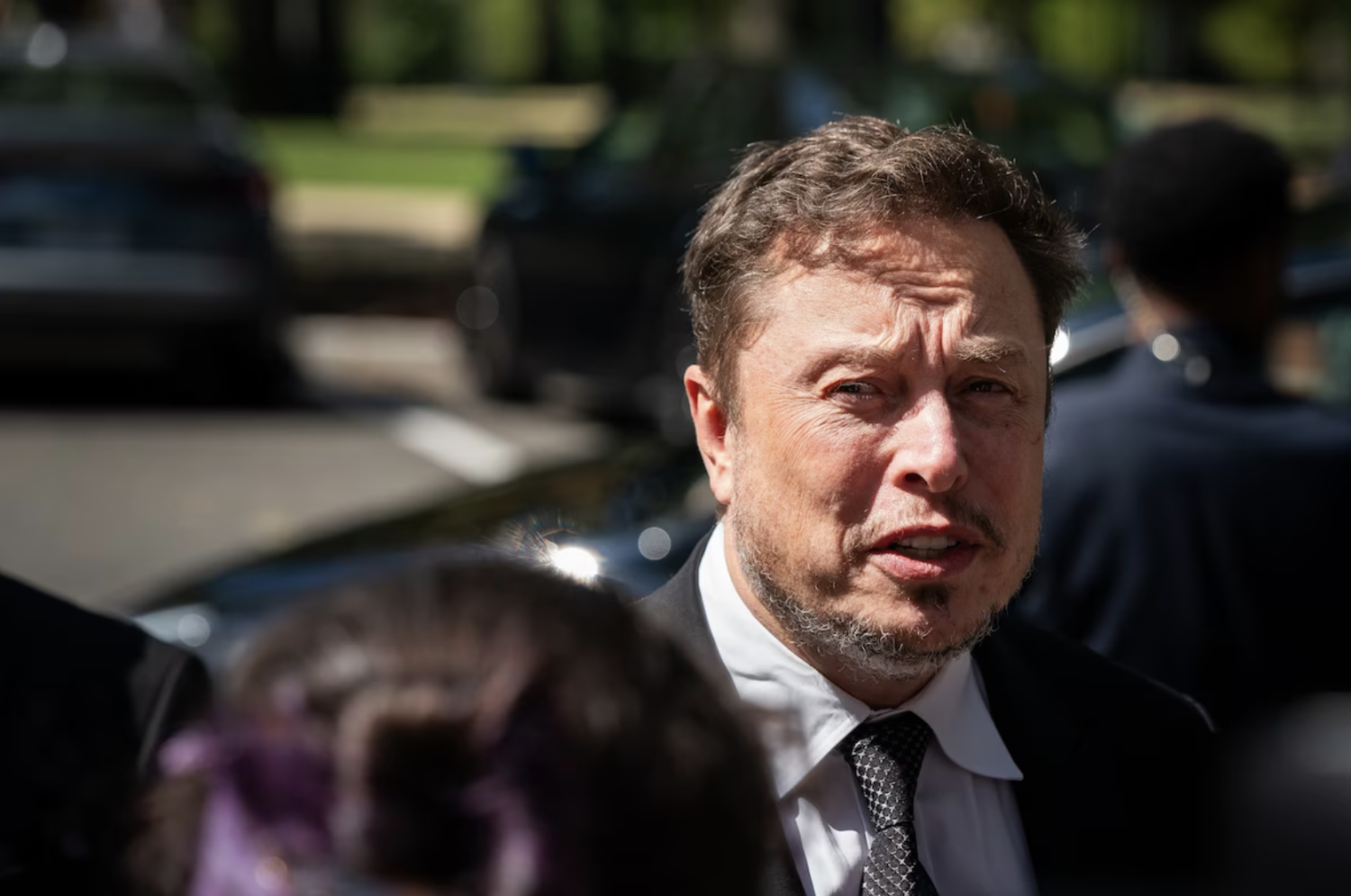 Elon Musk speaks to reporters as he leaves a Senate bipartisan Artificial Intelligence Insight Forum on Capitol Hill in Washington on Sept. 13. (Elizabeth Frantz for The Washington Post)